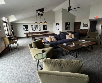 Game room with tv, pool, shuffleboard and mini bar